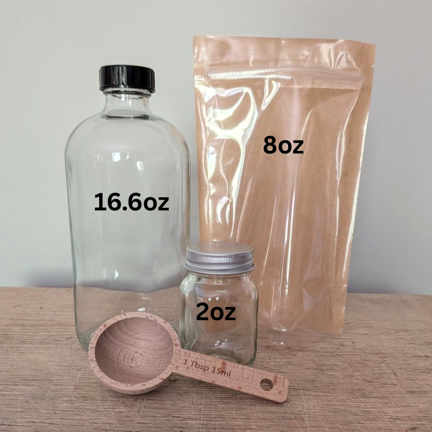 Three clear glass containers of different sizes with labels showing their capacities: 16.6oz, 2oz, and 8oz.