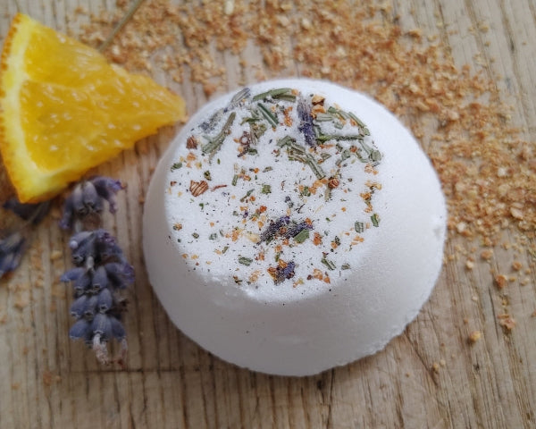dried floral shower steamer tablet with lavender and sweet orange essential oils for a uplifting shower