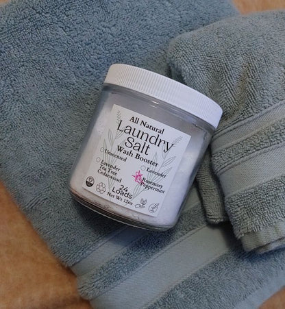 Jar of all natural laundry salt on a towel