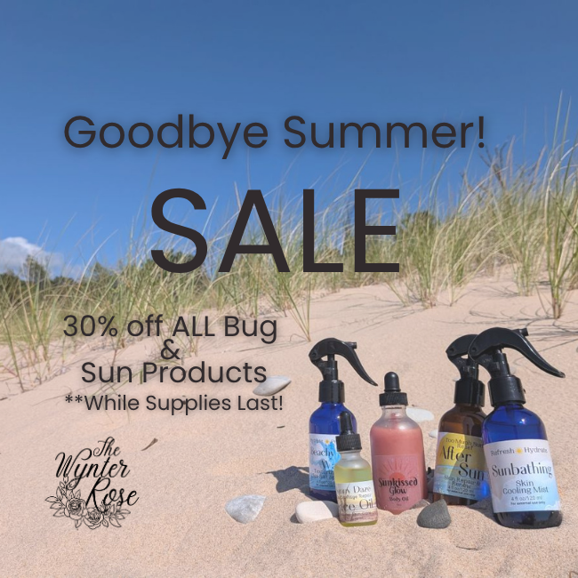 A promotional beach scene with dune grass, blue sky, and several bug and sun care bottles arranged on sand, overlaid with large sale text reading 'Goodbye Summer! SALE' and '30% off ALL Bug & Sun Products While Supplies Last!' plus the brand logo 'The Winter Rose'.