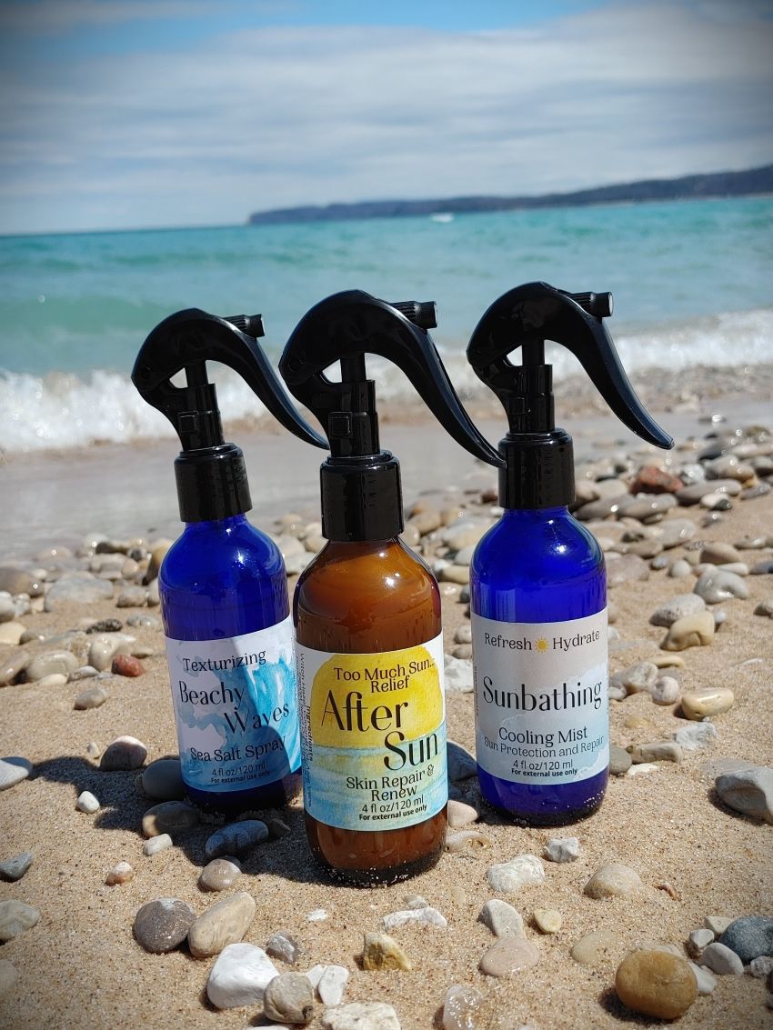 plant based sun skin care collection from the wynter rose beachy waves sea salt spray after sun aloe based spray unbathing peppermint cooling mist michigan glen arbor sandy beach beach stone and fresh water waves