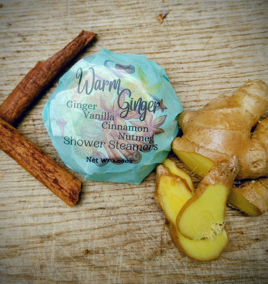 warm ginger shower steamer all natural steamer with ginger and cinnamon on wood board